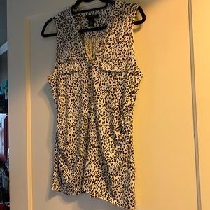 Sleeveless blouse.  Bottom down. Perfect